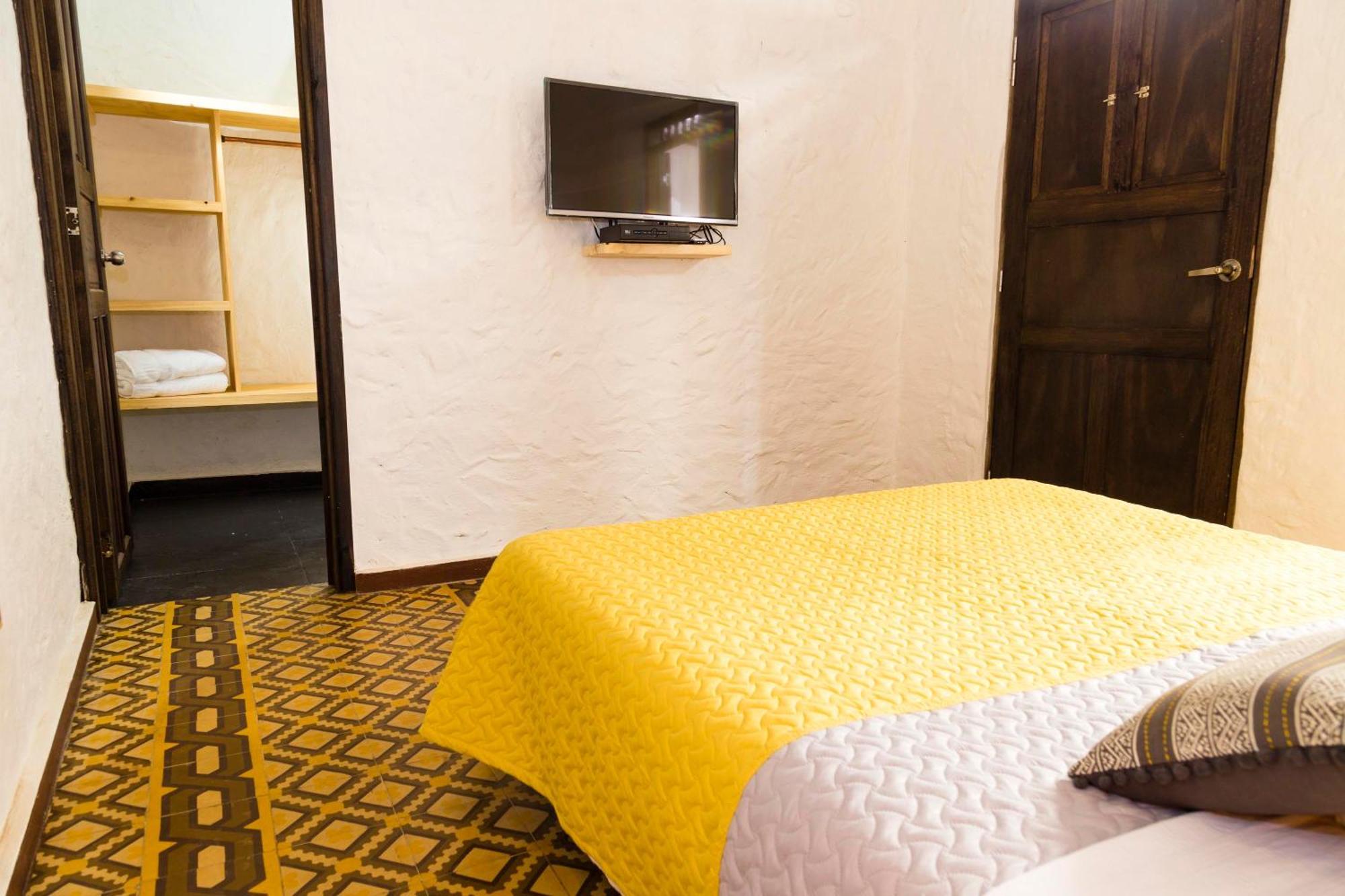 Hotel Mulato Ел Колехио Стая снимка